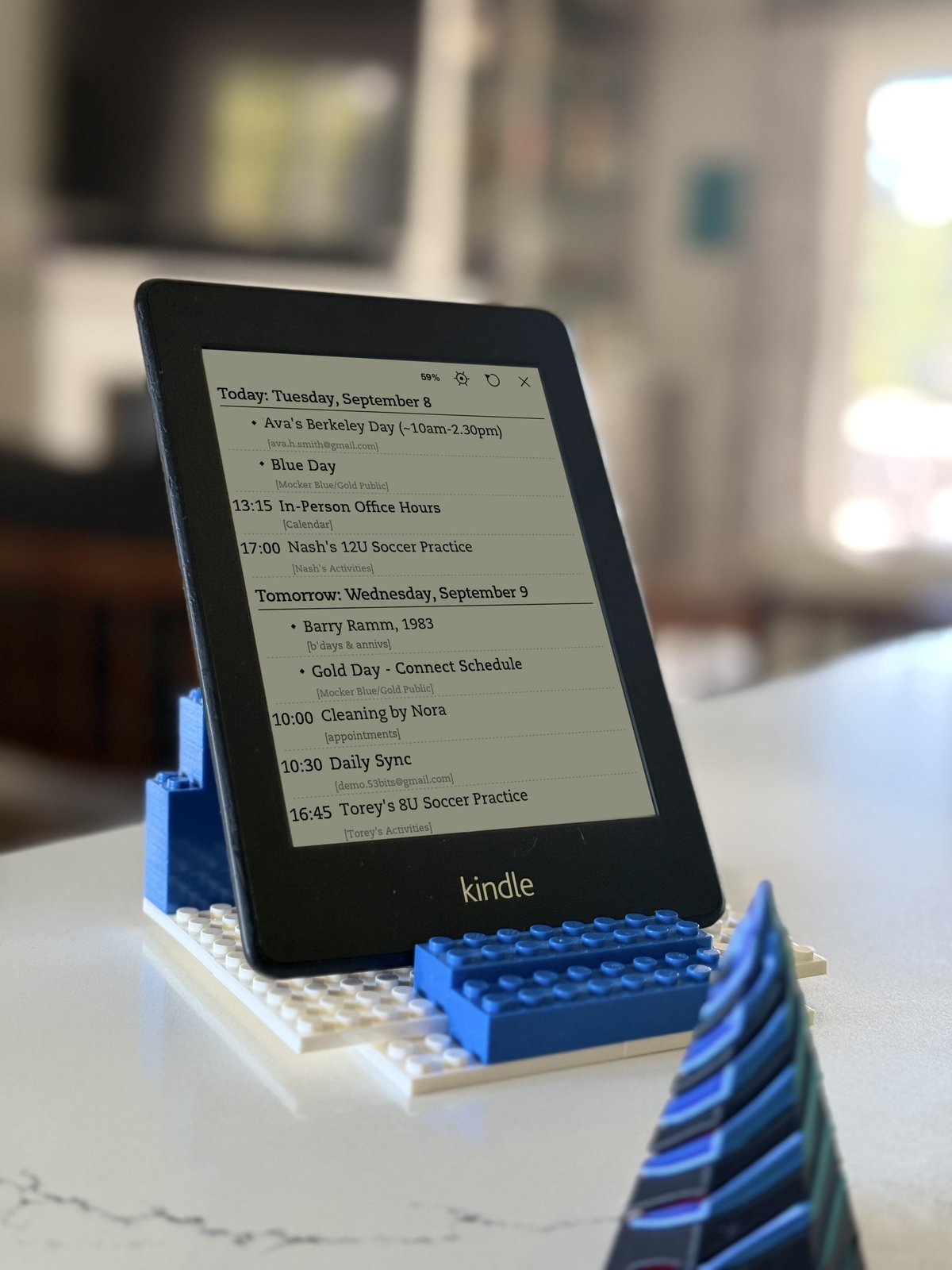 CalDash running on a Kindle e-reader propped on a desk stand